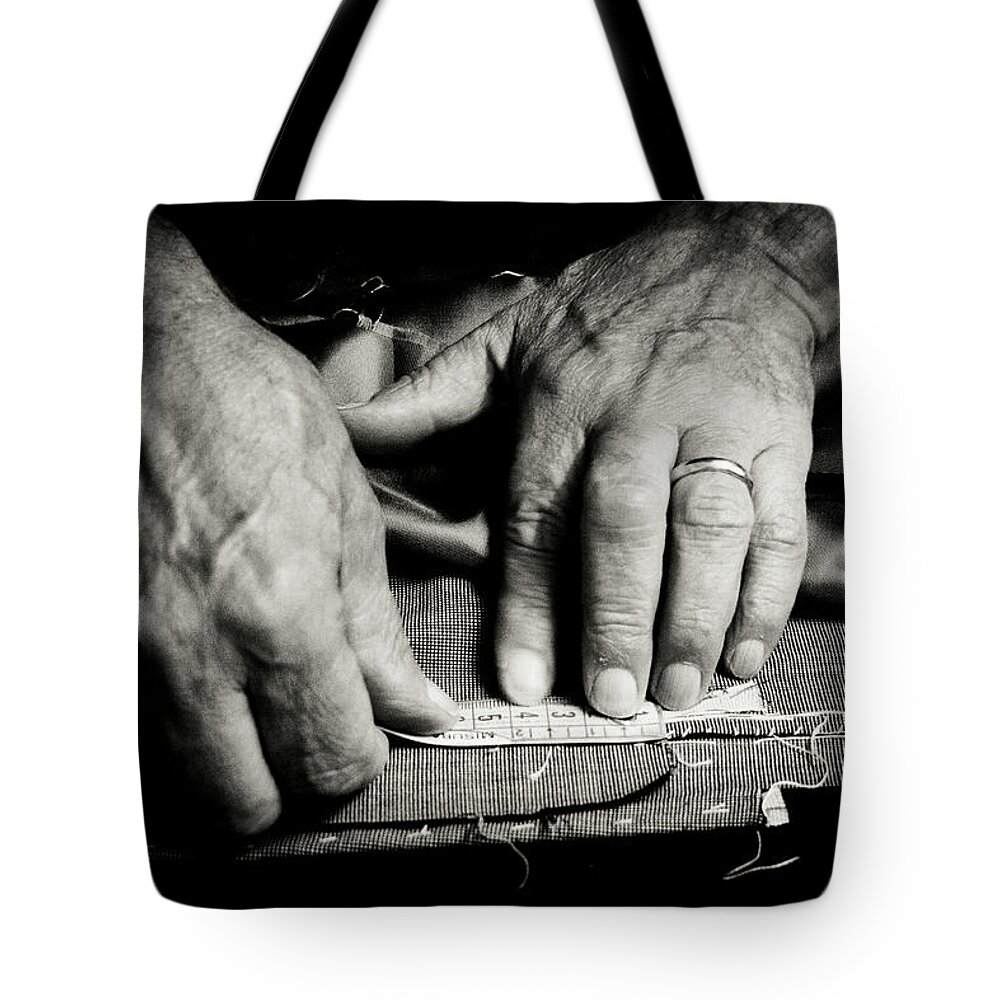 Expertise Tote Bag featuring the photograph Tailor At Work by Gmalandra