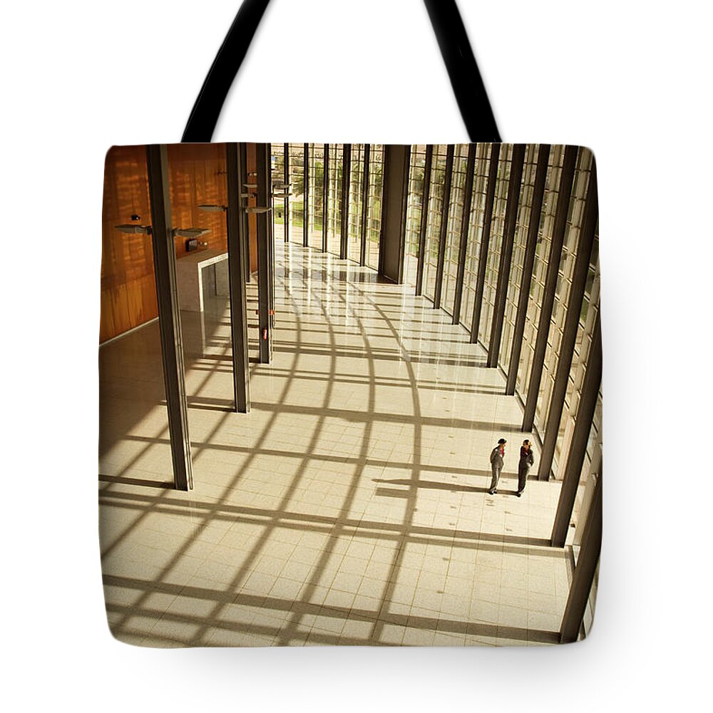 Working Tote Bag featuring the photograph Talking By The Door by Ll28