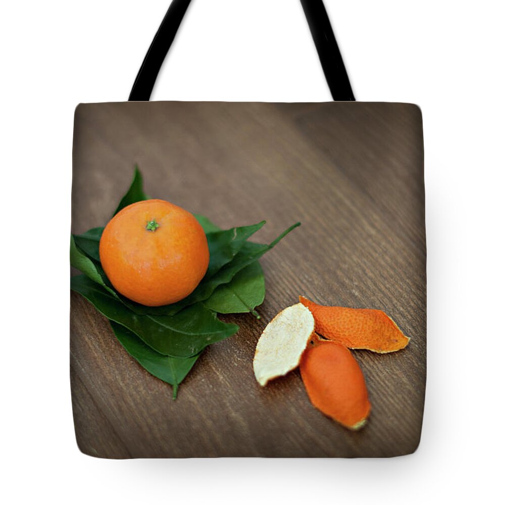 Wood Tote Bag featuring the photograph Tangerine by Carla Corigliano