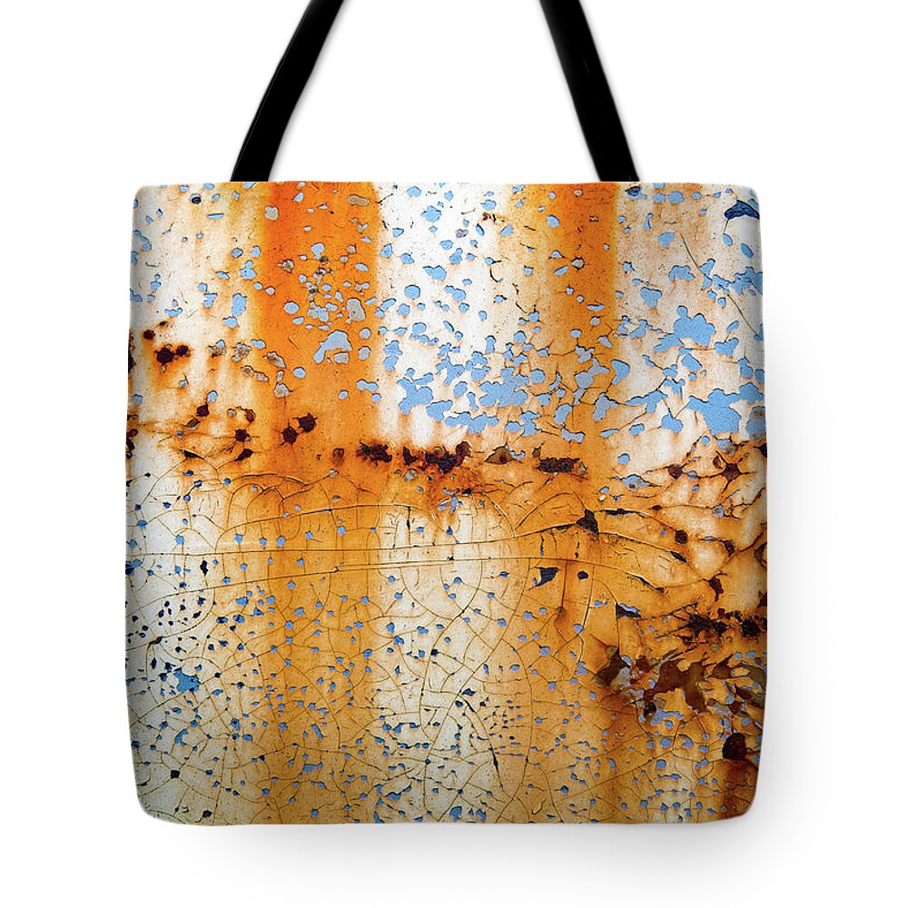 Blue And Orange Tote Bag featuring the photograph The Dance Of Blue by Jani Freimann