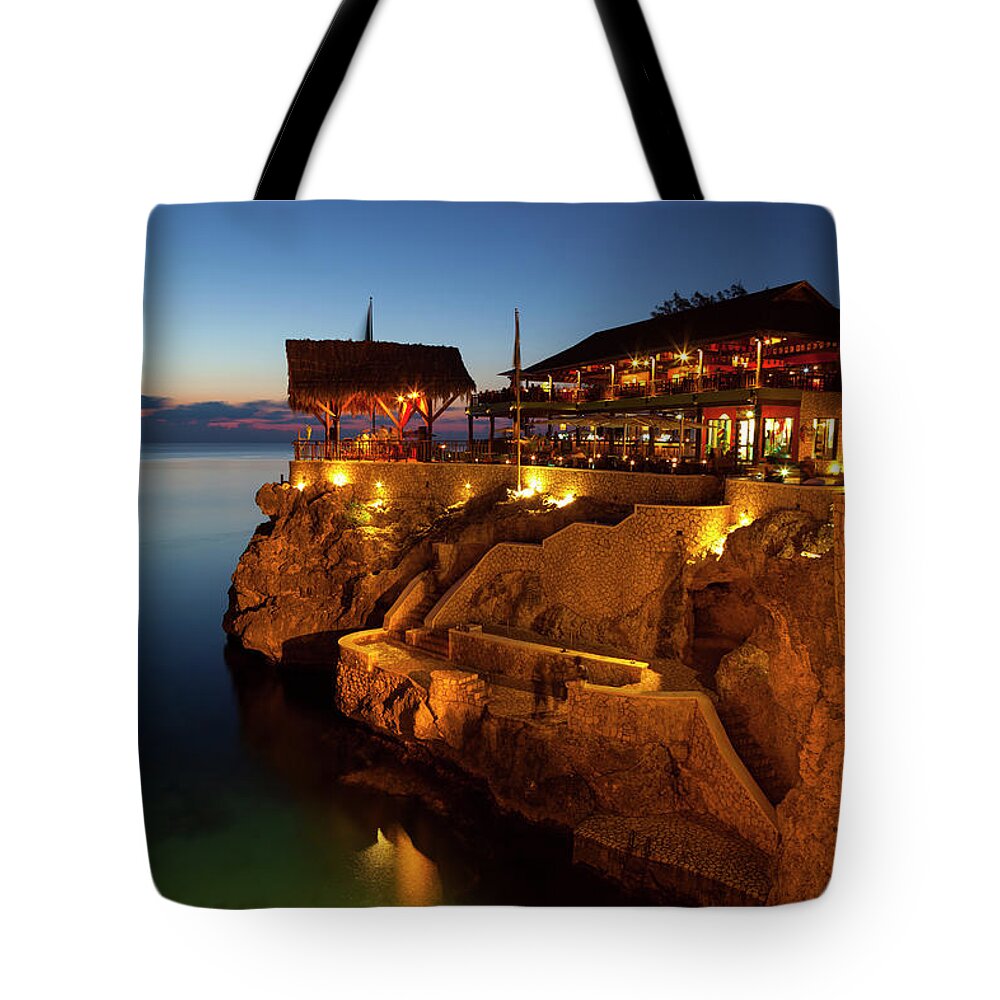 Tranquility Tote Bag featuring the photograph The Famous Ricks Cafe, Negril, Jamaica by Douglas Pearson