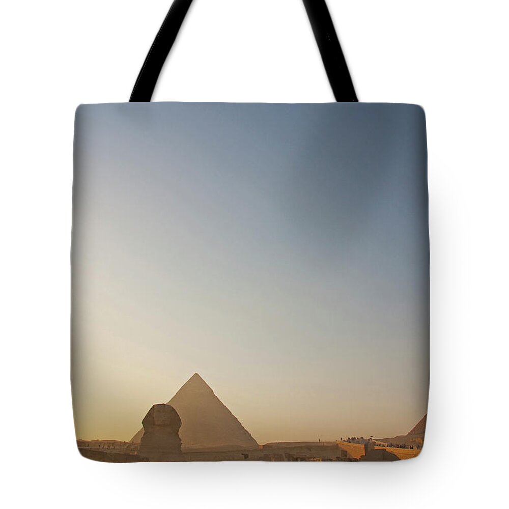 Scenics Tote Bag featuring the photograph The Giza Pyramids And Sphinx At Sunset by Matt Champlin