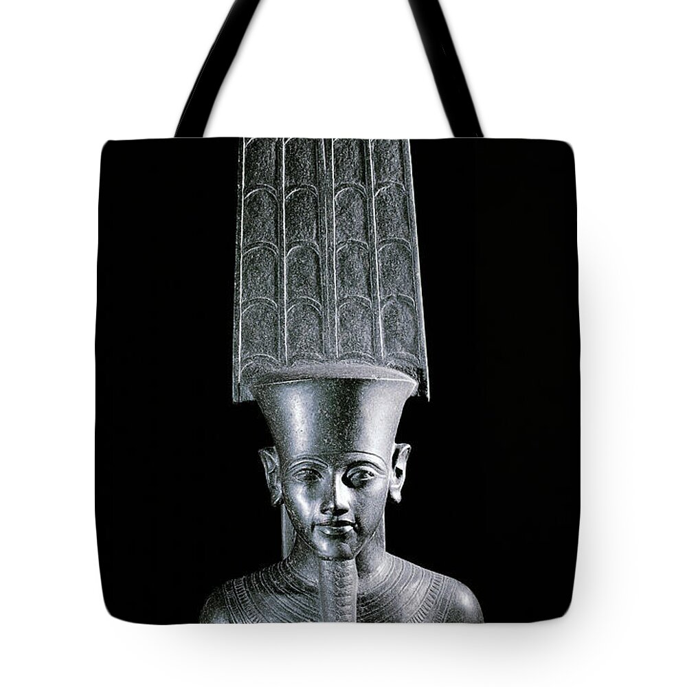 Egyptian Tote Bag featuring the sculpture The god Amon, protecting the pharaoh Tutankhamun by Egyptian School