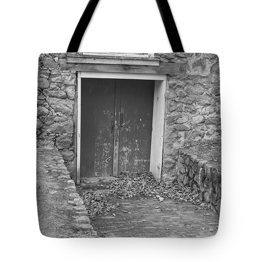 Waterloo Village Tote Bag featuring the photograph The Mill Door - Waterloo Village by Christopher Lotito