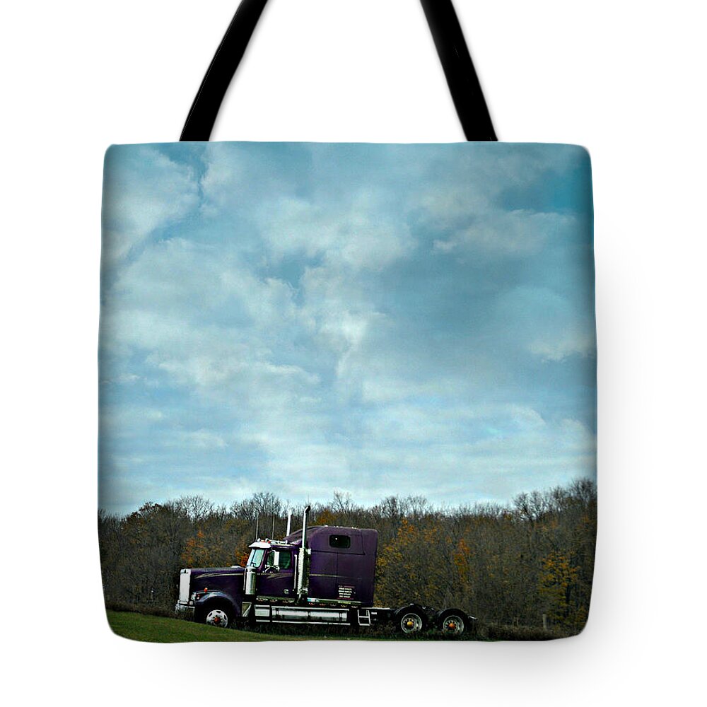 The Purple Betty Tote Bag featuring the photograph The Purple Betty by Cyryn Fyrcyd
