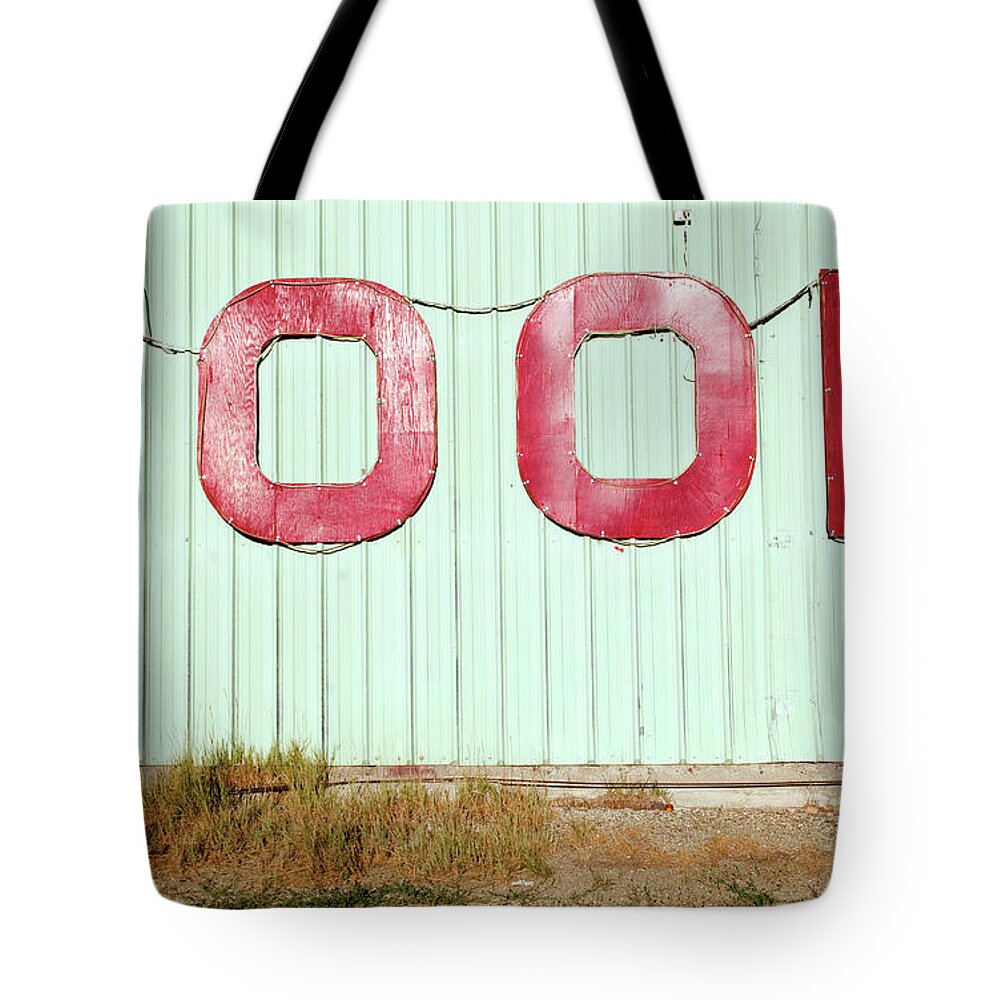 Social Issues Tote Bag featuring the photograph The Word Food On The Side Of A by Pete Starman