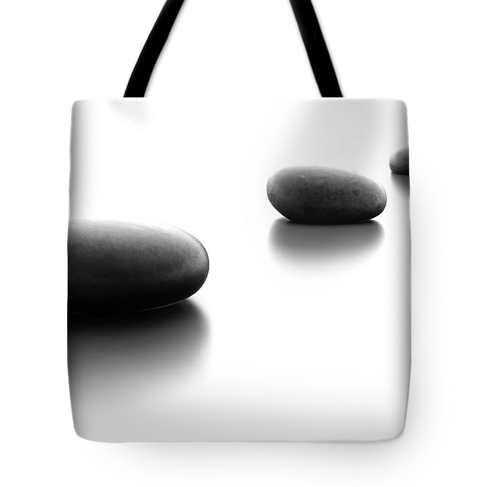 Chinese Culture Tote Bag featuring the photograph Three Pebble Stones In A Row by Fpm