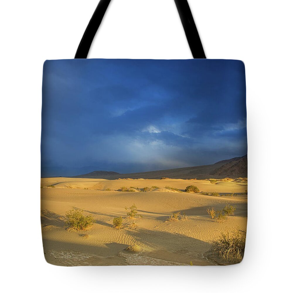 Death Valley Clouds Tote Bag featuring the photograph Thunder over the desert by Kunal Mehra