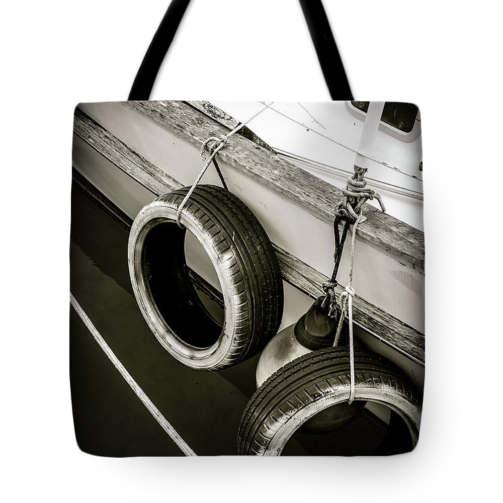 Boat Tote Bag featuring the photograph Tire Swing Sailing by Becqi Sherman