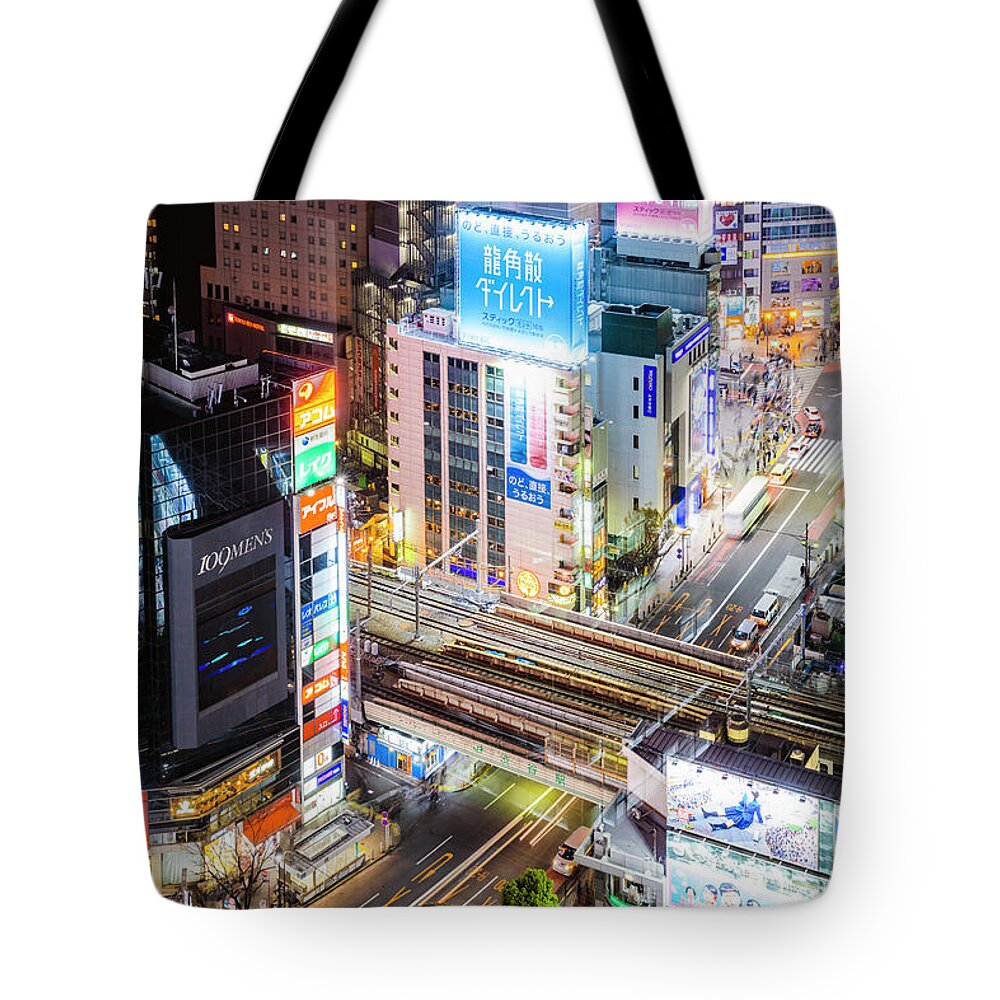 Tokyo Night Tote Bag featuring the photograph Tokyo lights, Japan by Matteo Colombo