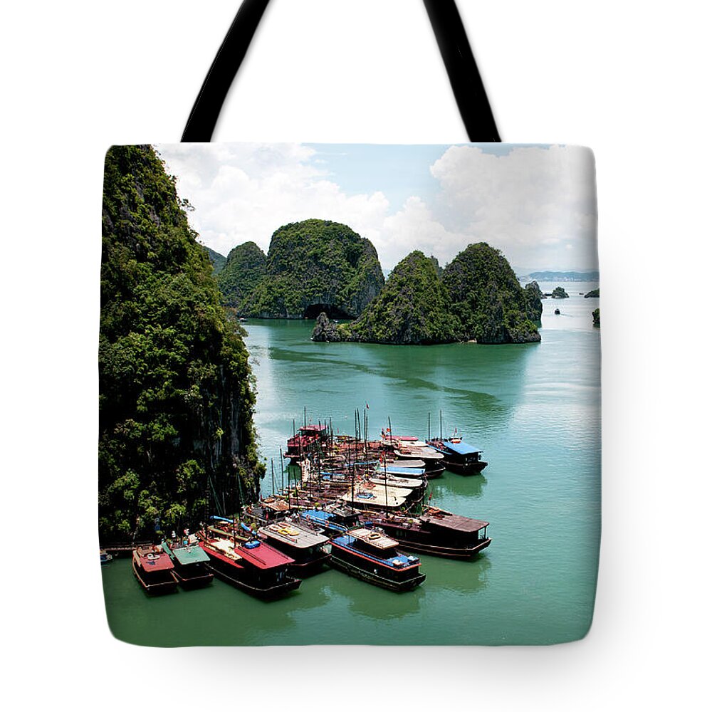 Seascapes Tote Bag featuring the photograph Tourist boats, Halong Bay, Vietnam by Michalakis Ppalis