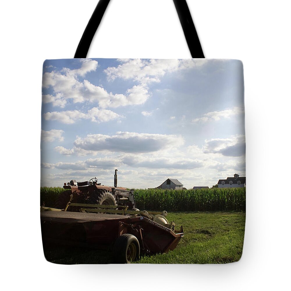Tractor Stop Tote Bag featuring the photograph Tractor Stop by Dylan Punke