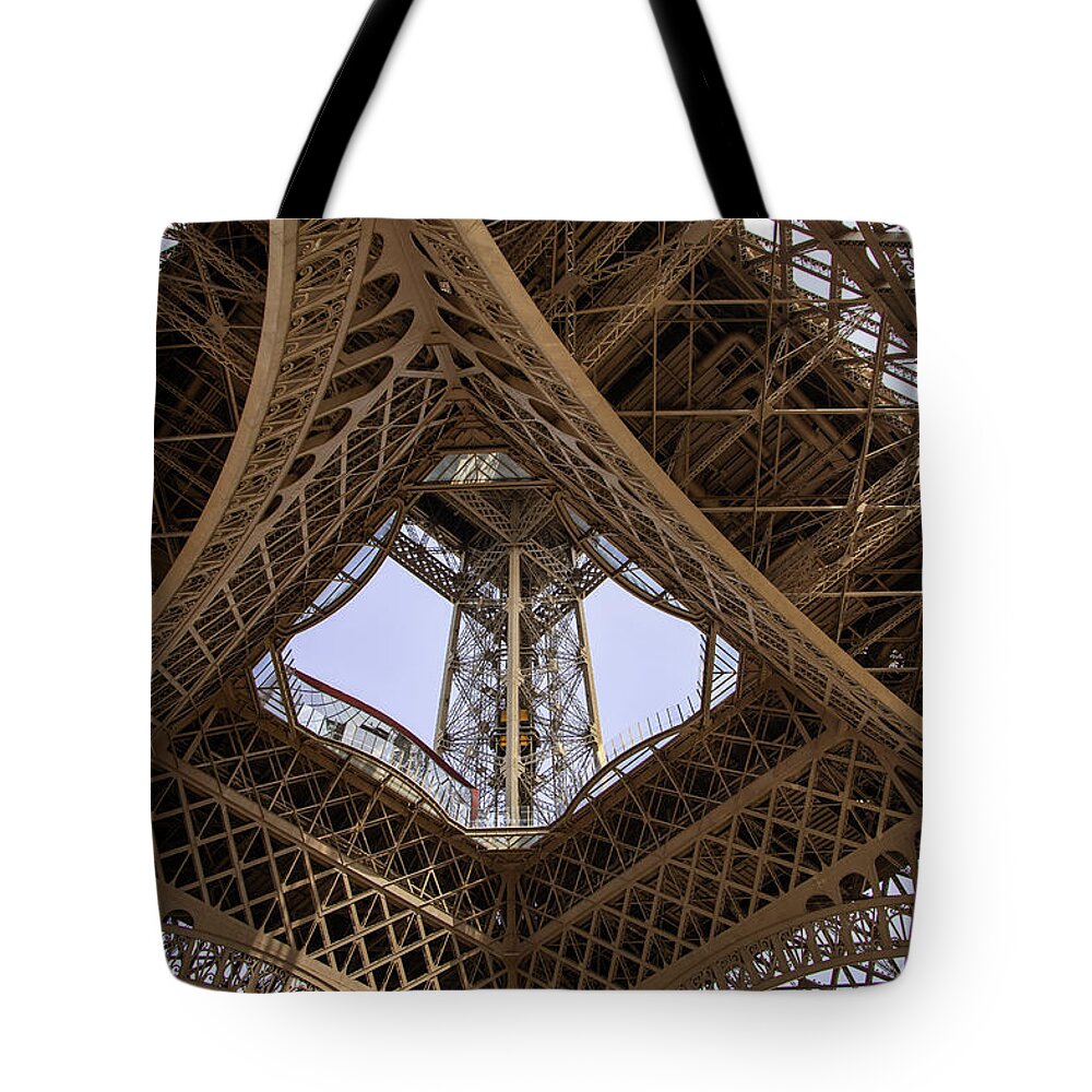 Paris Tote Bag featuring the photograph Under The Eiffel Tower by Rocco Silvestri
