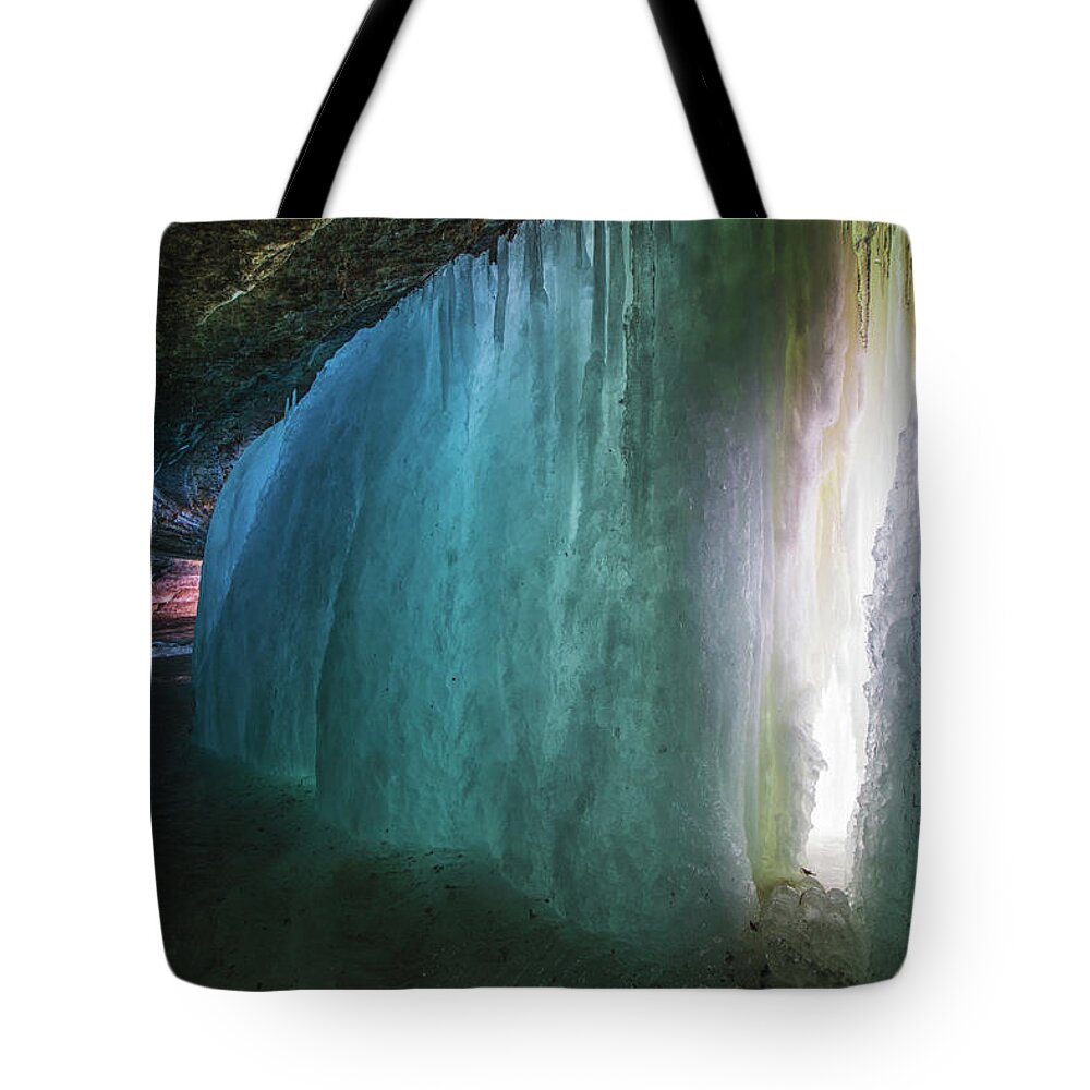 Minneapolis Tote Bag featuring the photograph Ice caves under the Minnehaha Falls by Jay Smith