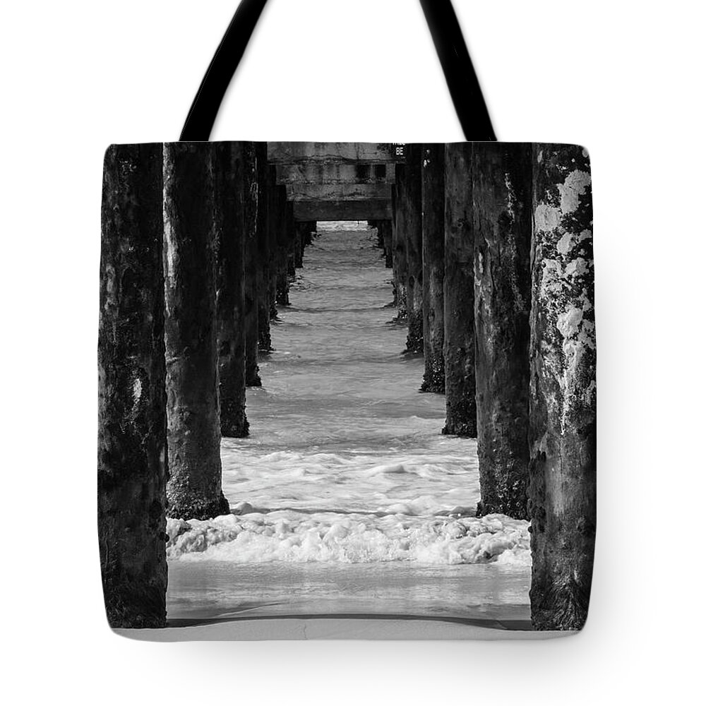Pier Tote Bag featuring the photograph Under the pier #2 BW by Stuart Manning