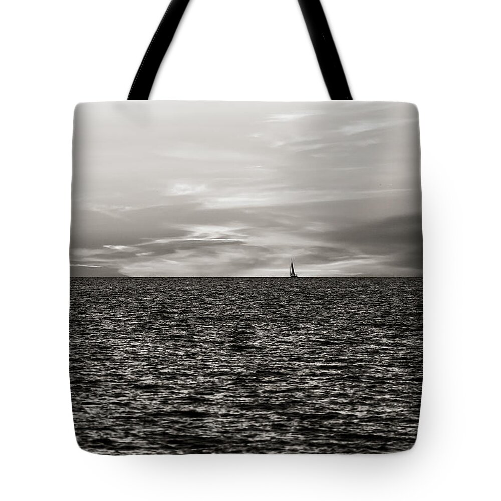 Sea Tote Bag featuring the photograph Vela al tramonto 07654 by Marco Missiaja