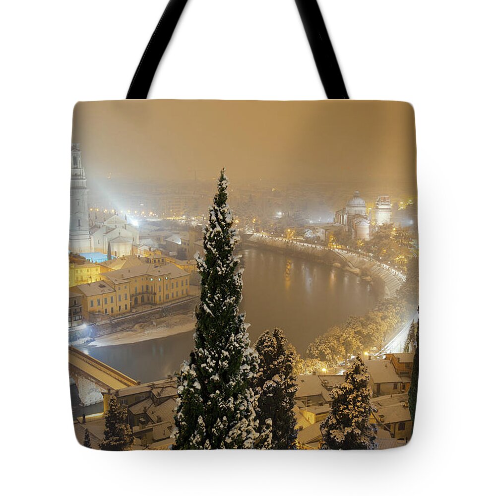 Scenics Tote Bag featuring the photograph Verona By Night Under The Snow In Winter by Moreiso