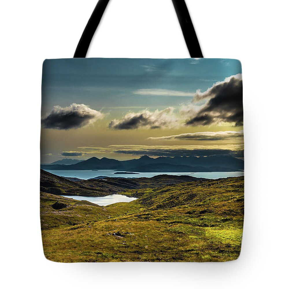 Adventure Tote Bag featuring the photograph View From Applecross Pass To Scenic Landscape And The Isle Of Skye In Scotland by Andreas Berthold