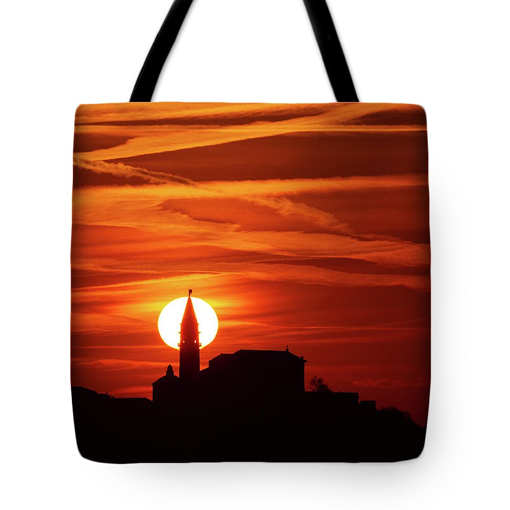 Sunset Tote Bag featuring the photograph View of Saint George's Parish Church in Piran at sunset by Ian Middleton