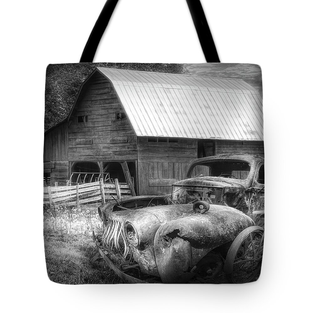 Barns Tote Bag featuring the photograph Vintage in the Pasture Black and White by Debra and Dave Vanderlaan