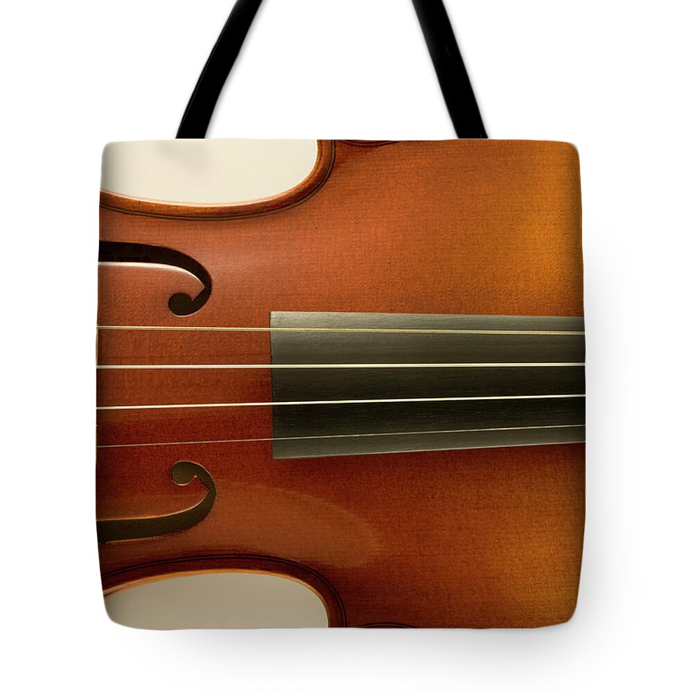 Music Tote Bag featuring the photograph Violin by Amana Imagesrf