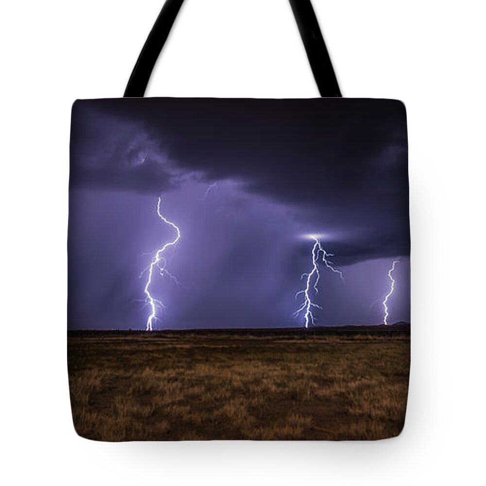 Lightning Tote Bag featuring the photograph Walking the Line by Aaron Burrows