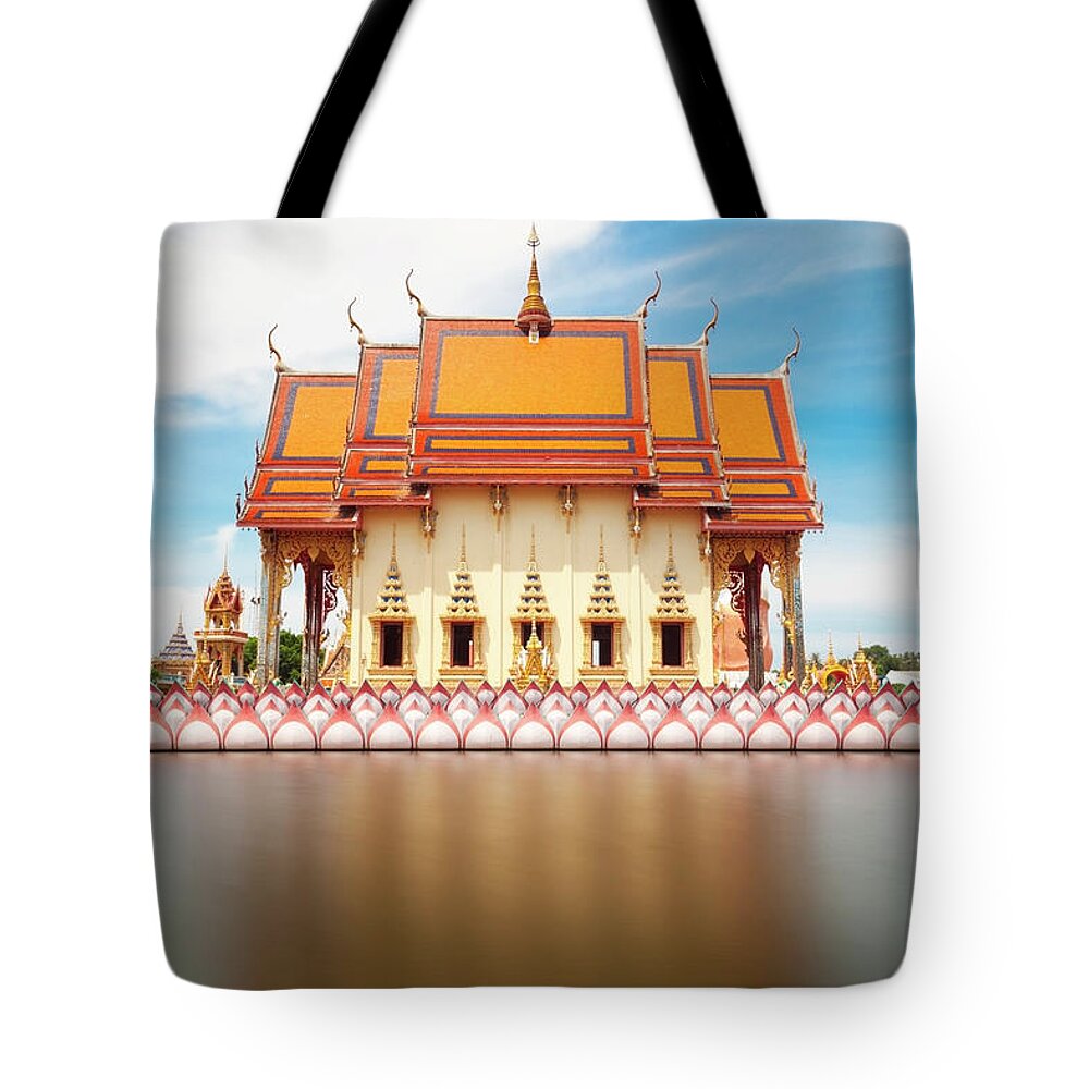 Scenics Tote Bag featuring the photograph Wat Plai Laem Temple by Bertlmann
