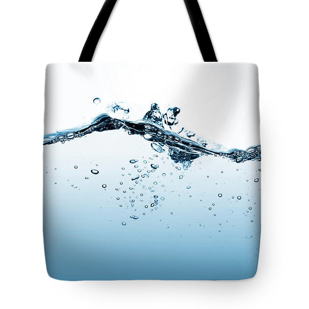 Purity Tote Bag featuring the photograph Water 4 by Guarosh