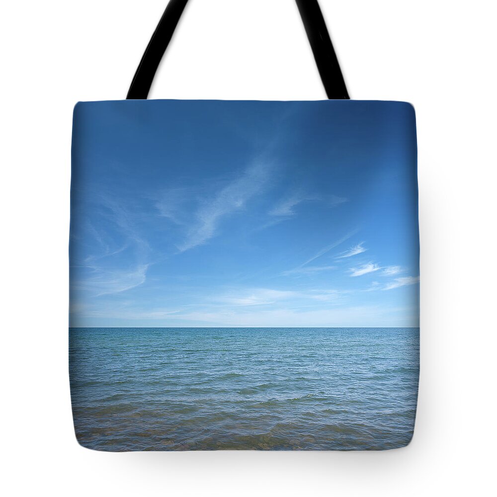 Water Surface Tote Bag featuring the photograph Water And Sky by Andrewjohnson