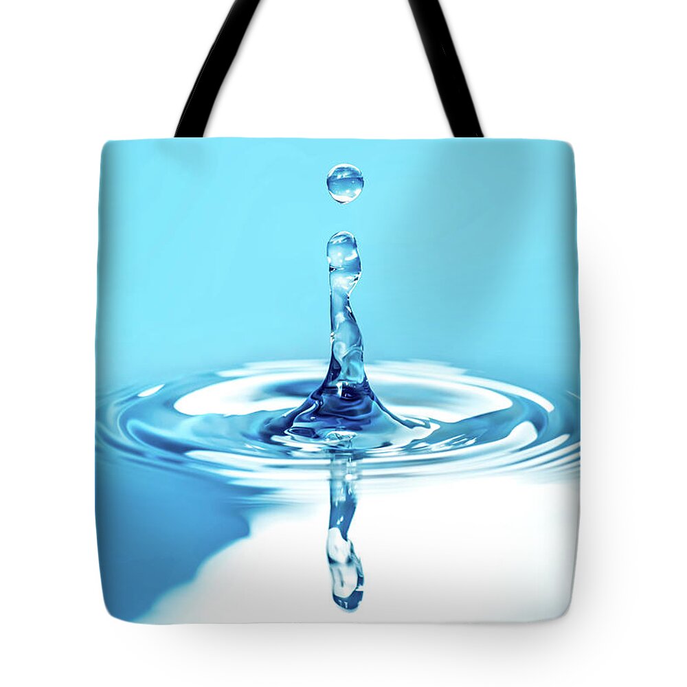 Sparse Tote Bag featuring the photograph Water Drop Collision by Krystiannawrocki