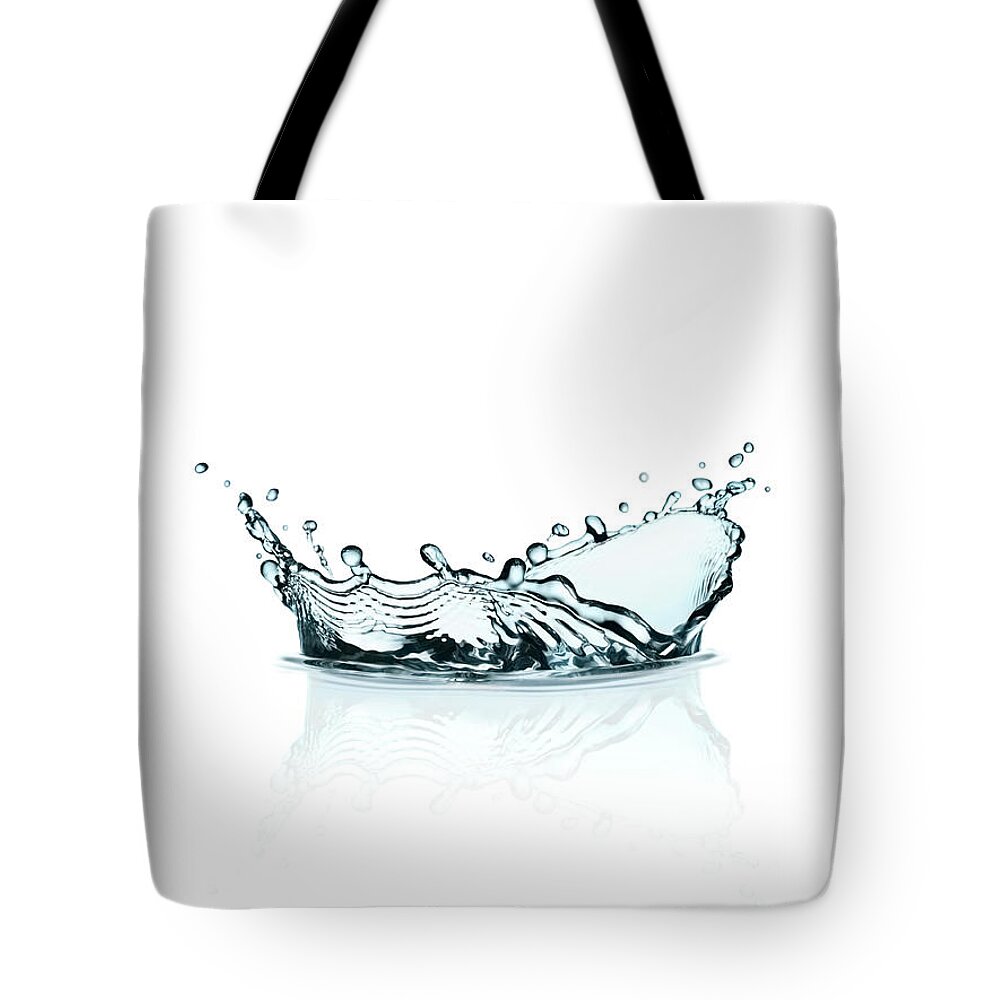 White Background Tote Bag featuring the photograph Water Splash by Kedsanee