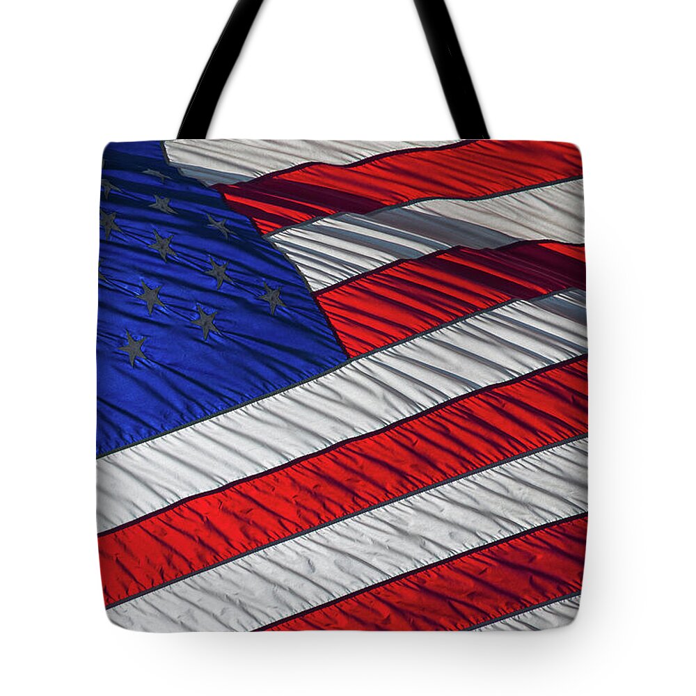 American Flag Tote Bag featuring the photograph Waving American Flag by David Smith