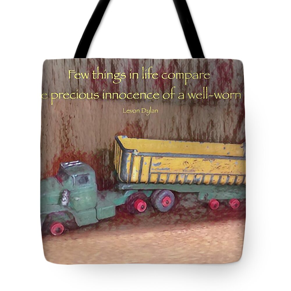 Toy Tote Bag featuring the photograph Well-Worn Toy by Jack Wilson