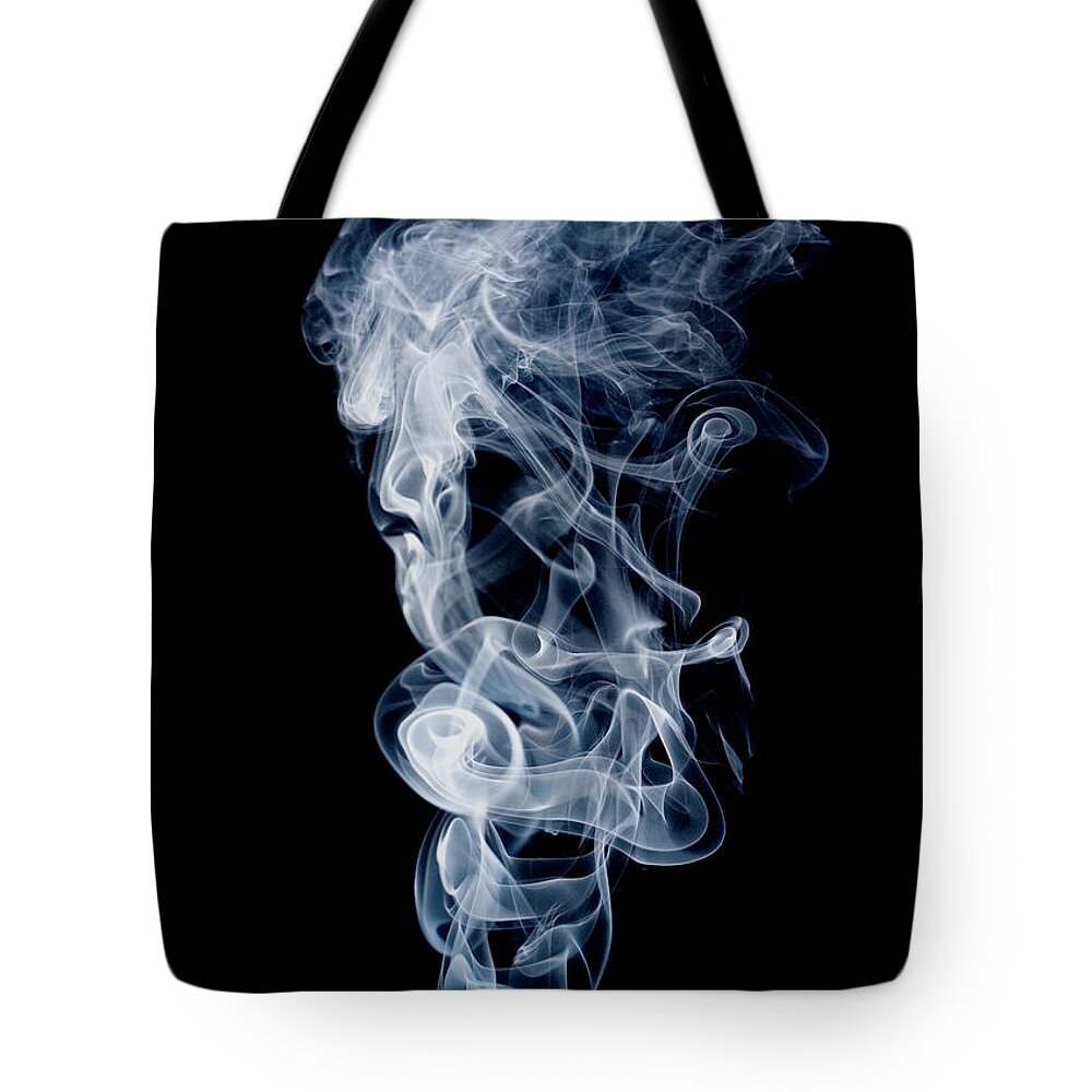Black Background Tote Bag featuring the photograph White And Blue Smoke by Mark Montgomery