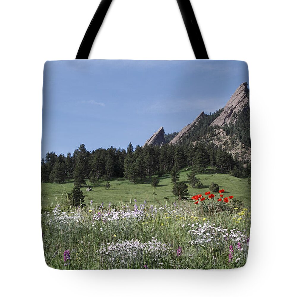 Tranquility Tote Bag featuring the photograph Wildflowers And The Flatirons by John Kieffer