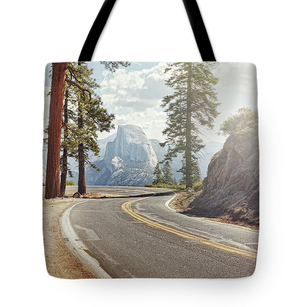 Scenics Tote Bag featuring the photograph Winding Road With Half Dome In Yosemite by James O'neil