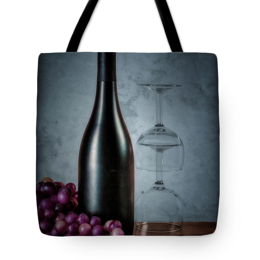 Wine Tote Bag featuring the photograph Wine Bottle and Two Glasses by Tom Mc Nemar