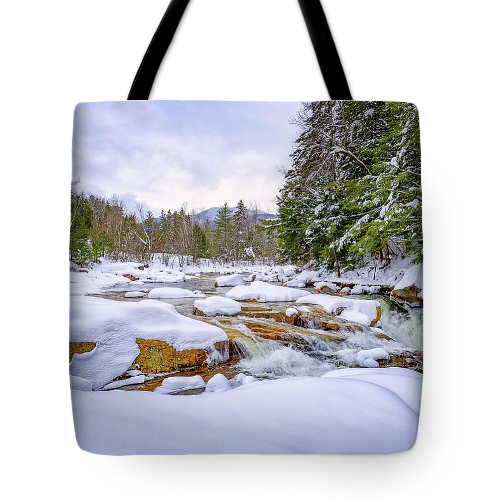 Snow Tote Bag featuring the photograph Winter On The Swift River. by Jeff Sinon
