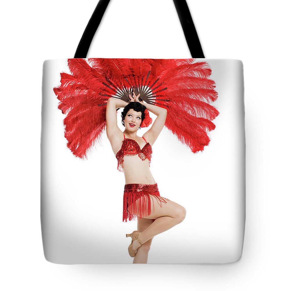 Feather Tote Bag featuring the photograph Woman Posing With Red Feathers by Allison Michael Orenstein