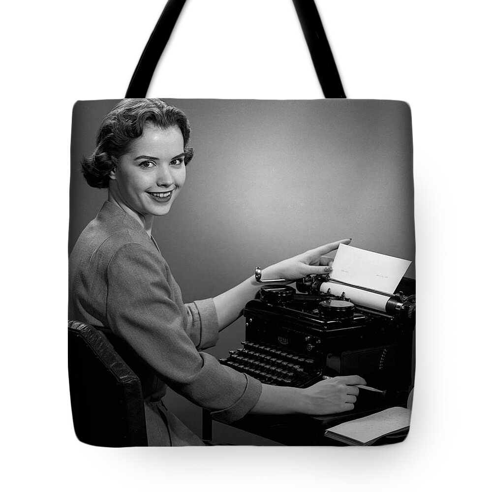 Working Tote Bag featuring the photograph Woman Working At Typewriter by George Marks