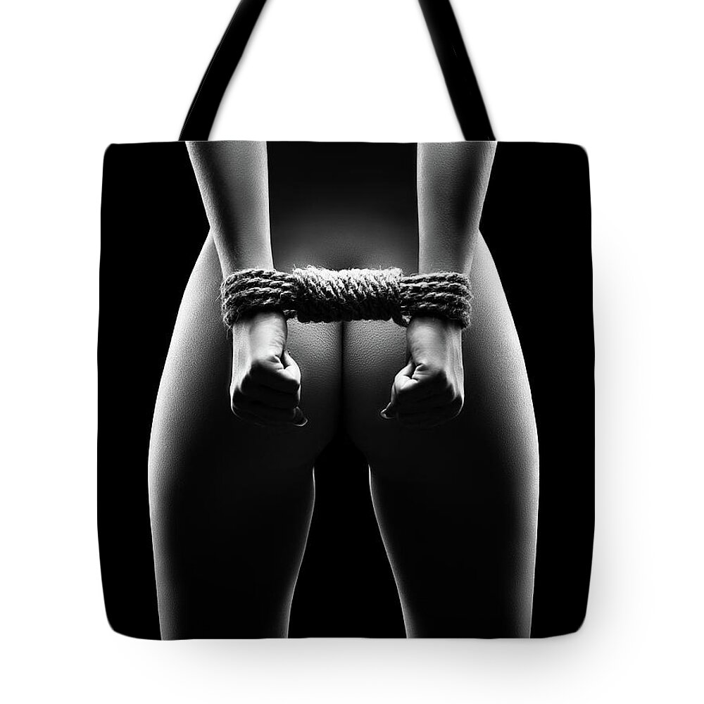 Woman Tote Bag featuring the photograph Woman's hands in bondage by Johan Swanepoel