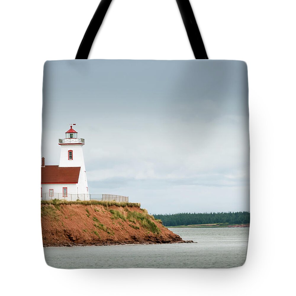 Water's Edge Tote Bag featuring the photograph Wood Islands Lighthouse by Westhoff