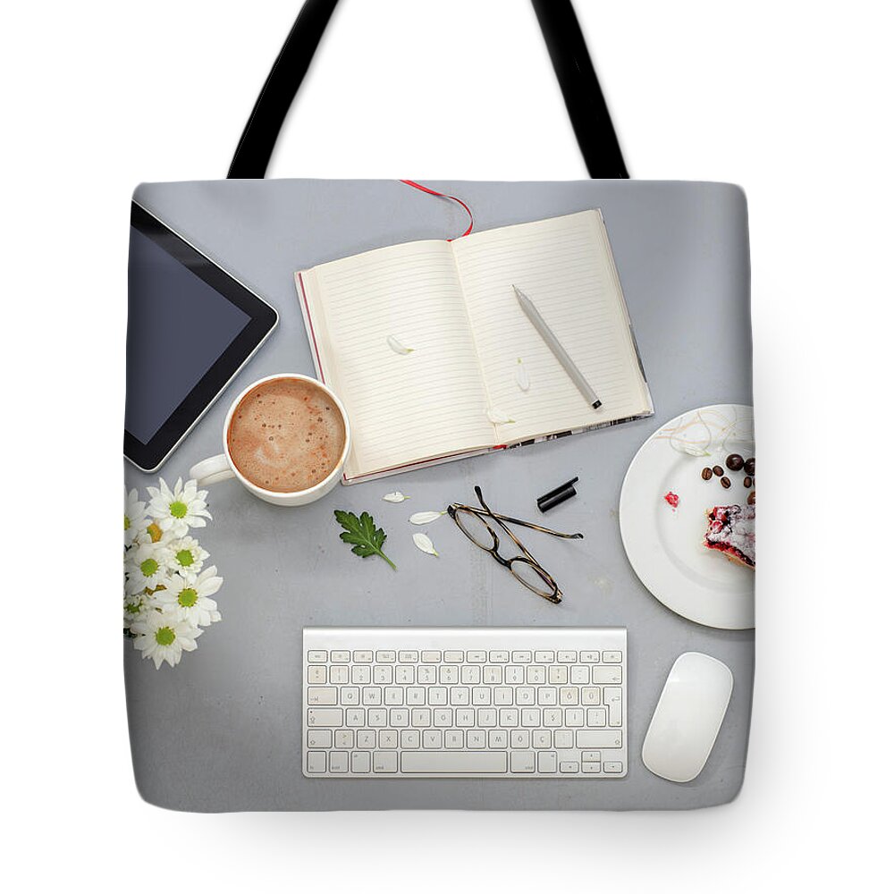 Computer Mouse Tote Bag featuring the photograph Working Desk With Objects by Ozgur Donmaz