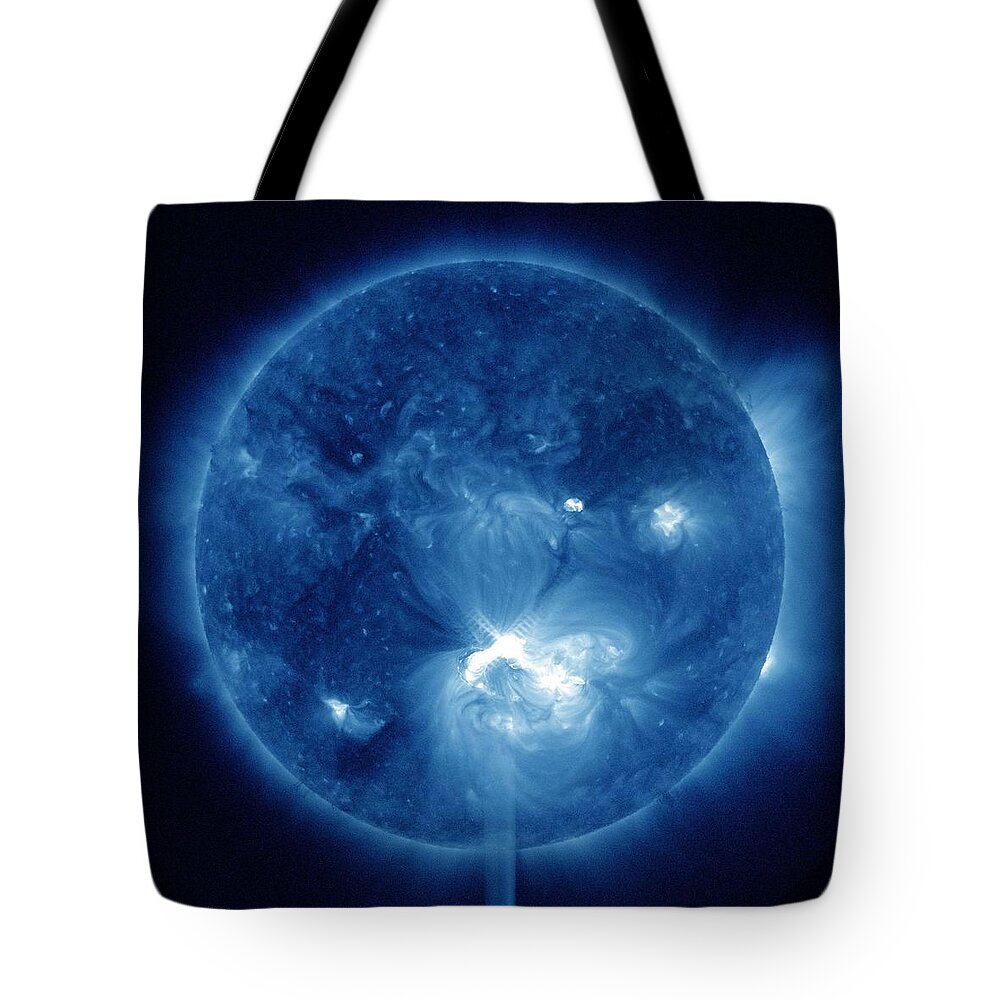 Light Tote Bag featuring the painting X1.4 Class Flare Released from Big Sunspot 1520 by Celestial Images