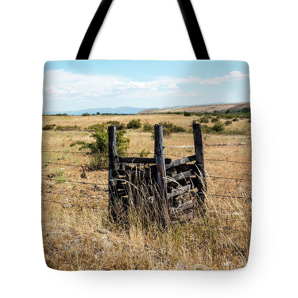 Yellow Grass And Fence Anchor Tote Bag featuring the photograph Yellow Grass and Fence Anchor by Tom Cochran