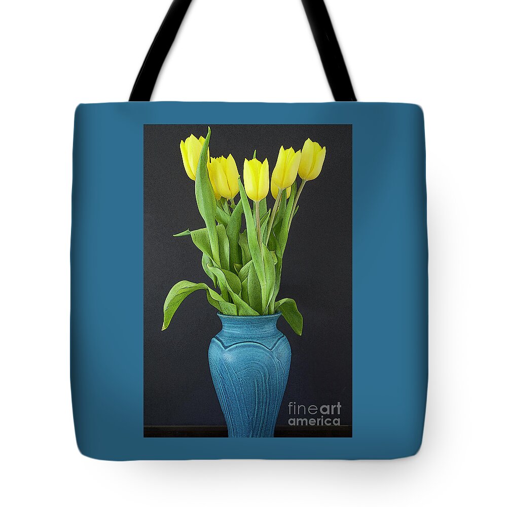 Tulips; Yellow; Blue Tote Bag featuring the photograph Yellow Tulips in Blue Vase by Ann Horn
