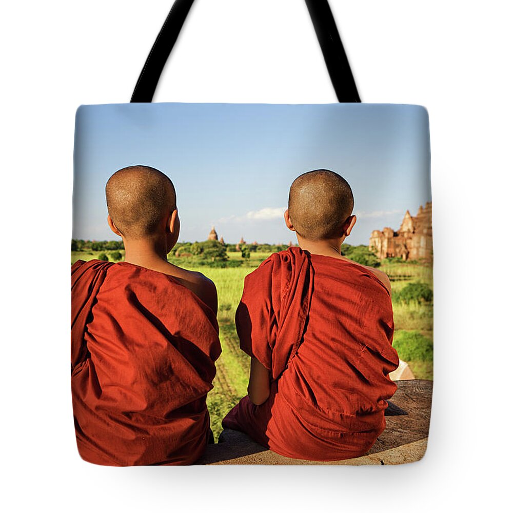 Scenics Tote Bag featuring the photograph Young Buddhist Monks by Hadynyah