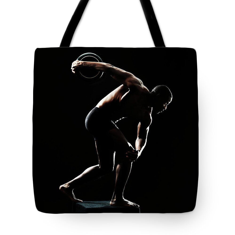 People Tote Bag featuring the photograph Young Man In Classic . Pose by Henrik Sorensen