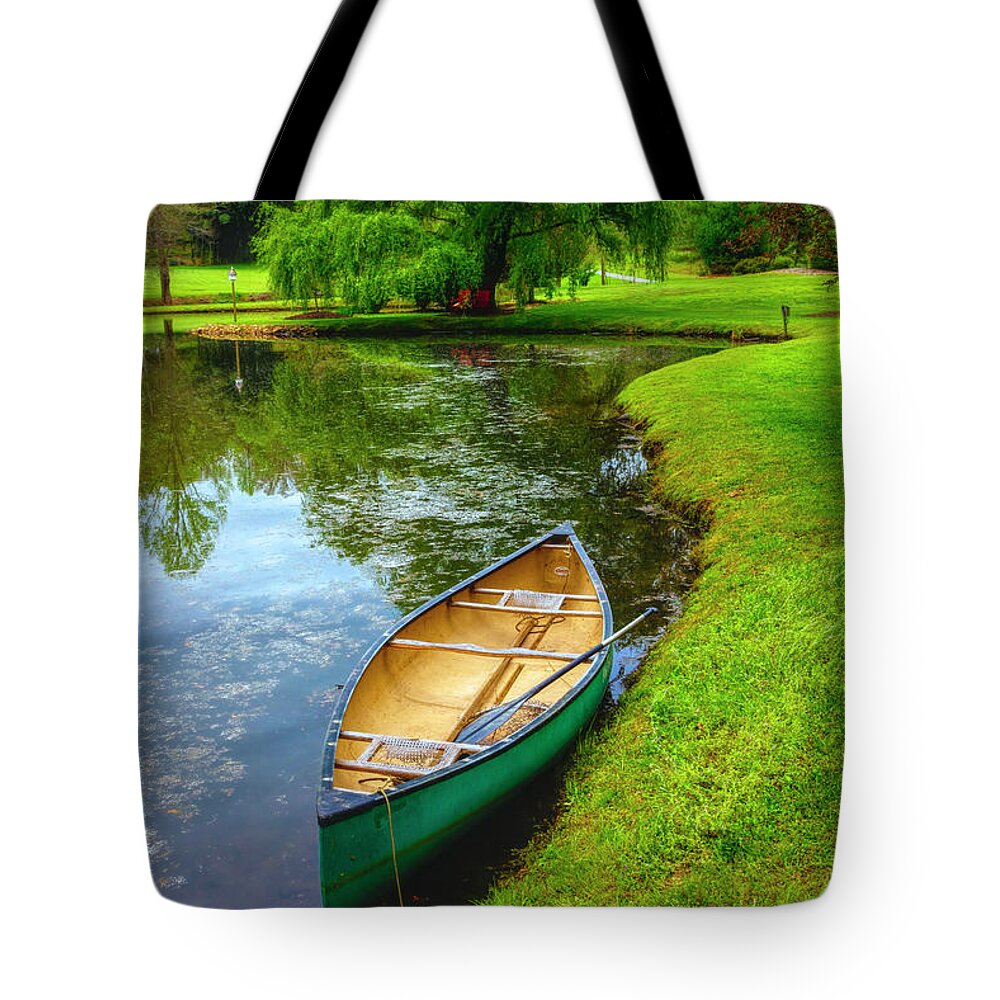 Boats Tote Bag featuring the photograph Canoe in Spring #1 by Debra and Dave Vanderlaan
