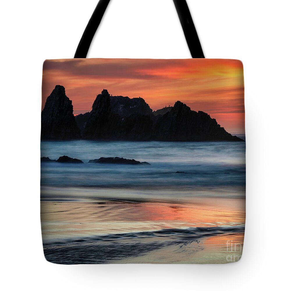 Oregon Tote Bag featuring the photograph Fiery sunset #1 by Izet Kapetanovic